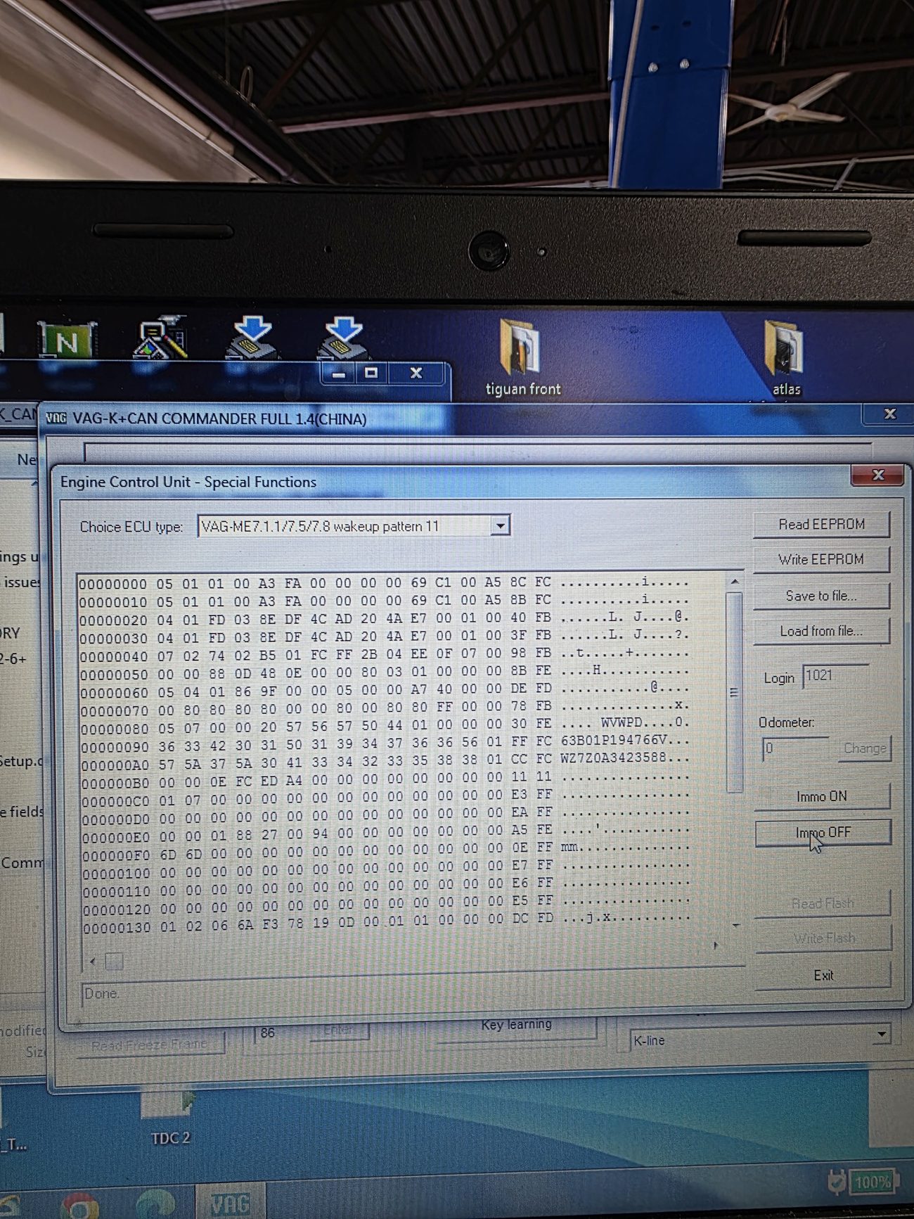 Laptop running immobilizer and key programming software on a vehicle ECU